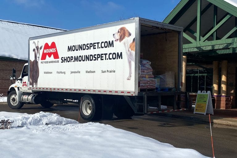 mounds truck with pallets of food unloading